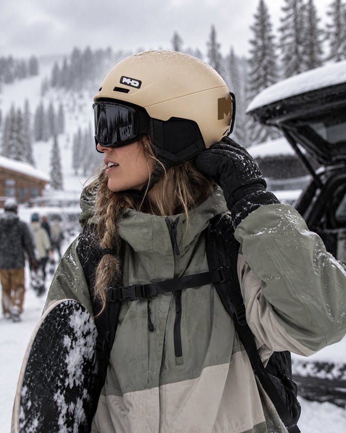 Woman wearing DUSTY snow helmet by MHD