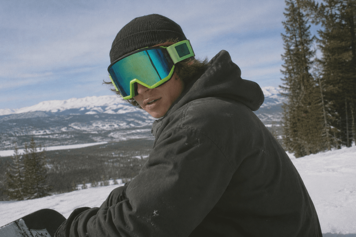 Snowboarder wearing Gremlin snow goggles by MHD on snow