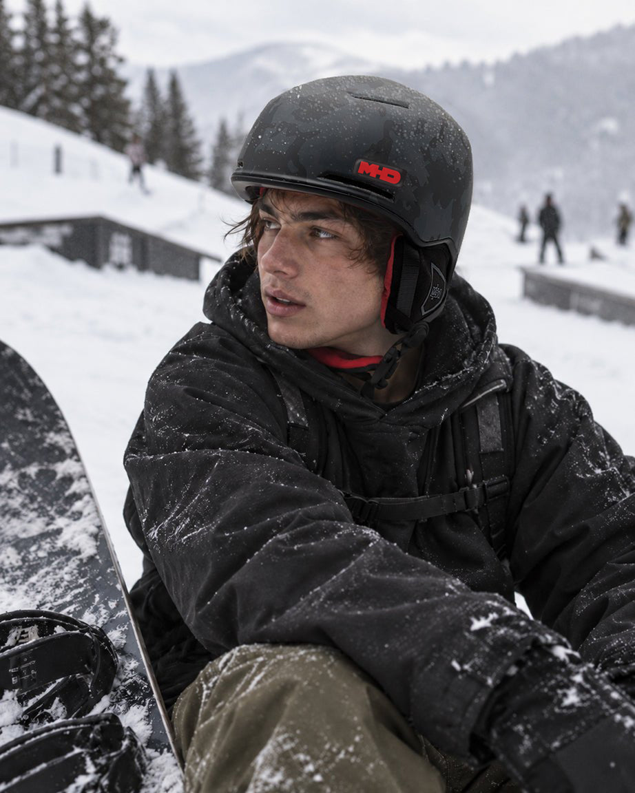 Rider wearing the Shredder snowboard helmet by MHD